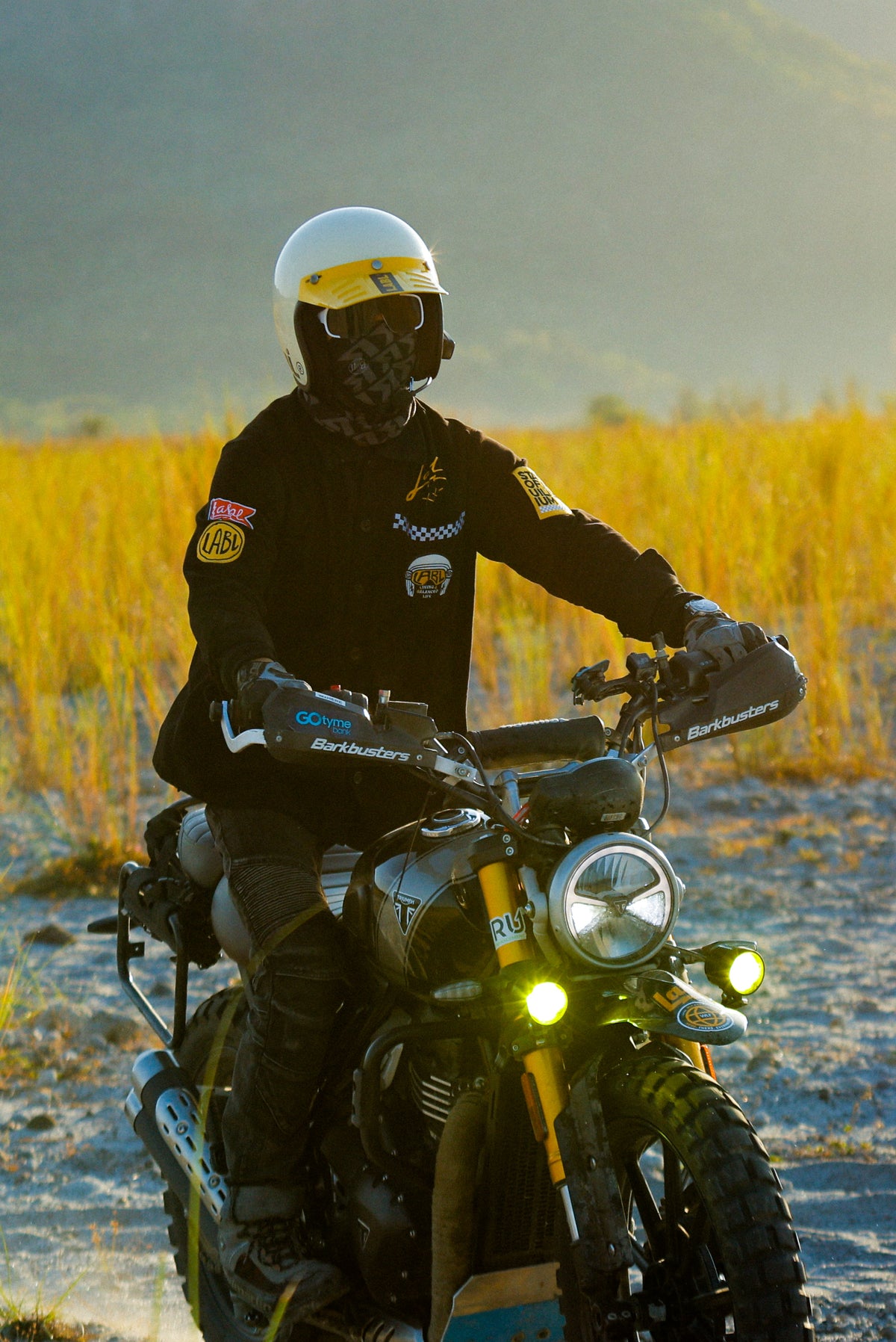 Rider leaning into a forest bend